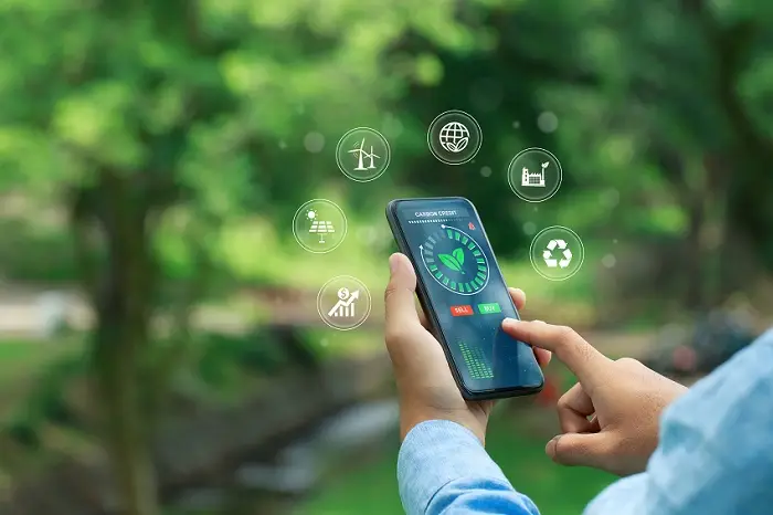Carbon,Credit,Concept.,Trader,Using,A,Smartphone,To,Trade,Carbon